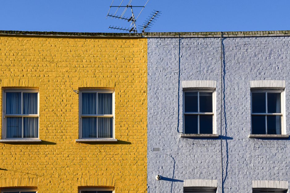 Yellow and blue painted house fronts